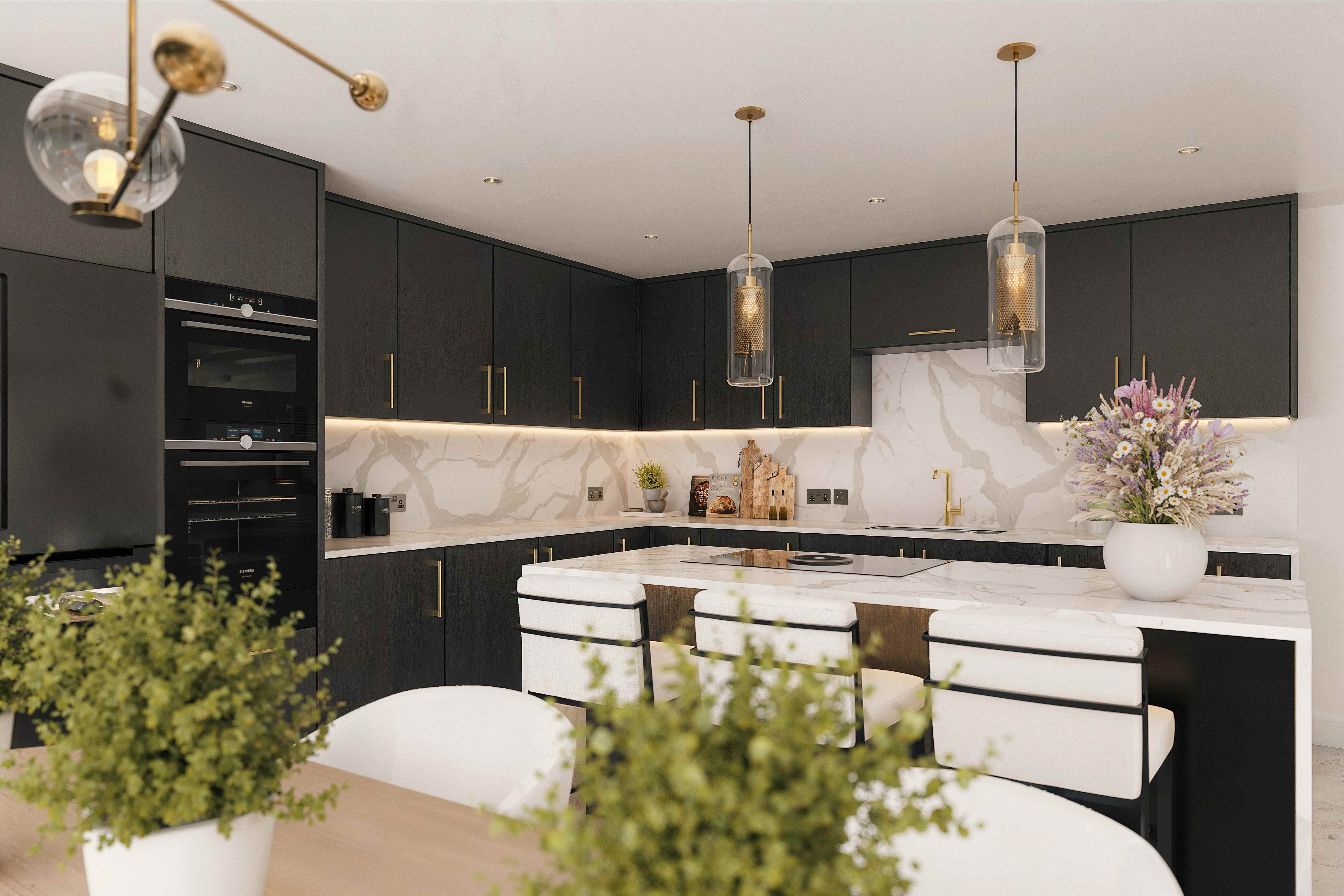 Bespoke kitchen with charcoal cabinetry, brass hardware and Calacatta marble