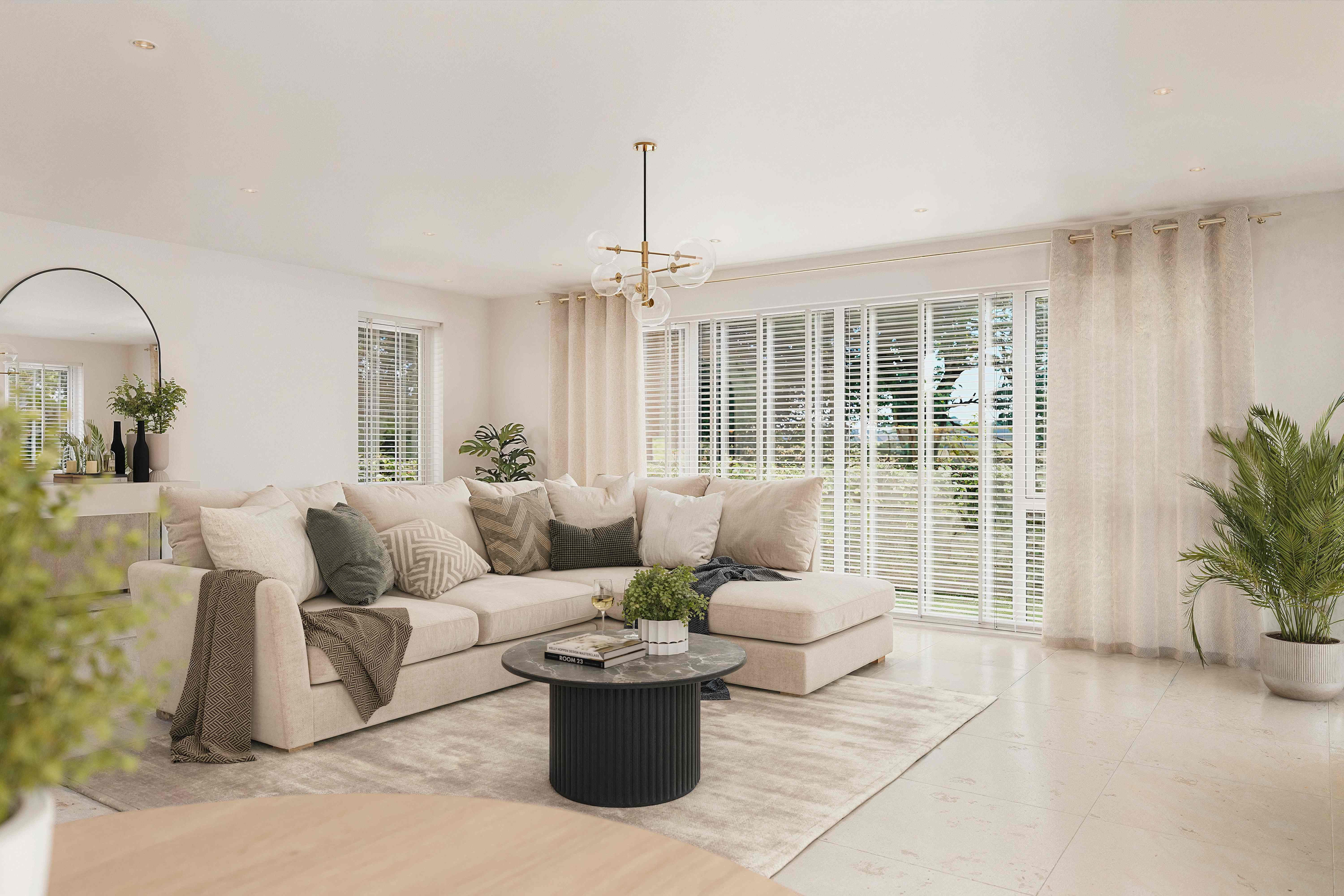 Bright living room with cream sectional and full-height glazing