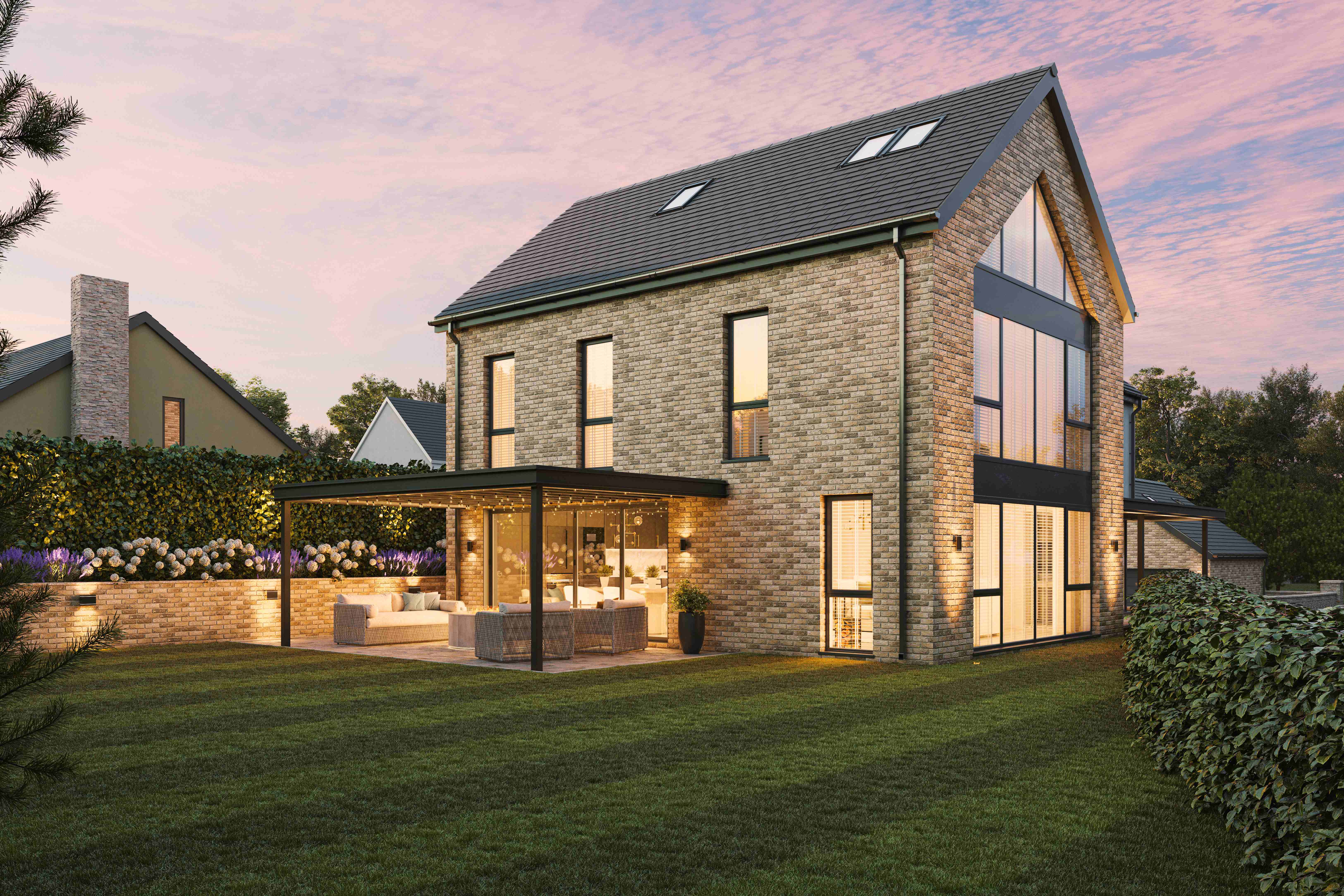 Rear elevation of the completed Old St Mellons home at dusk